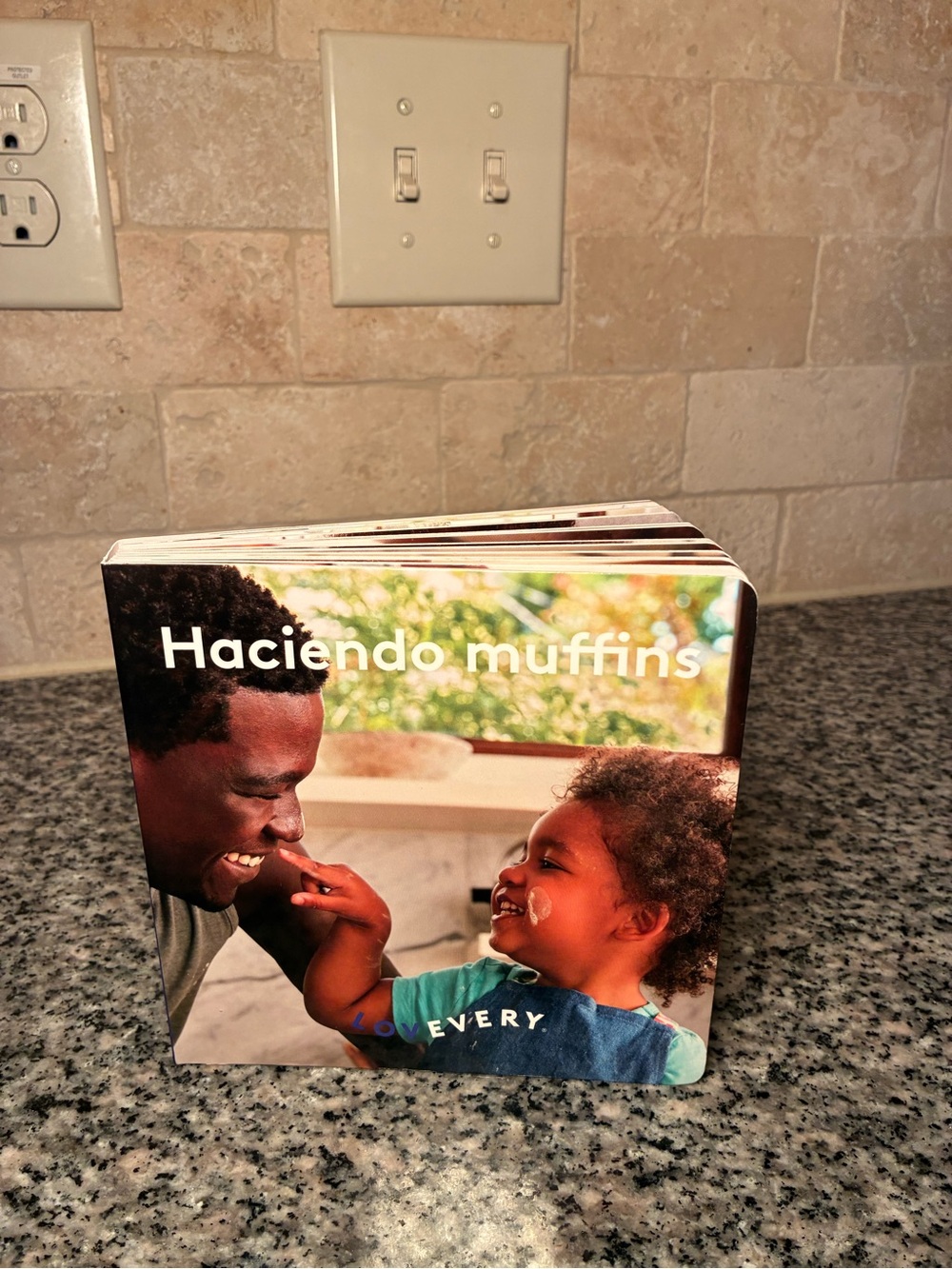 Lovevery Spanish Haciendo Muffins Lift the Flap Board Book